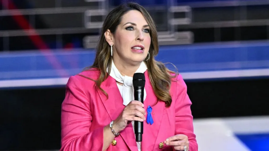 Ronna McDaniel holding a mic in the stage.